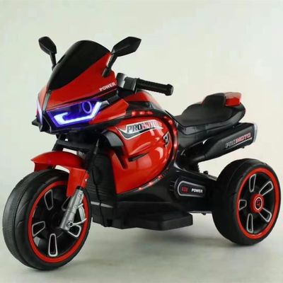 Witte elektrische kindermotorfiets driewieler met kleurrijk licht en 380*2 motor