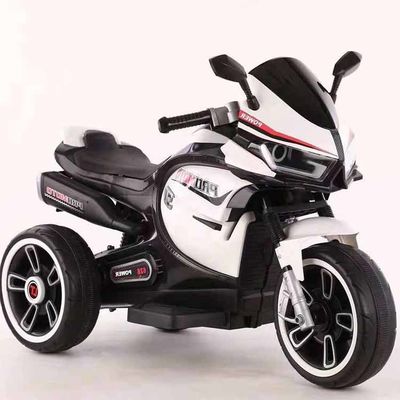 Witte elektrische kindermotorfiets driewieler met kleurrijk licht en 380*2 motor