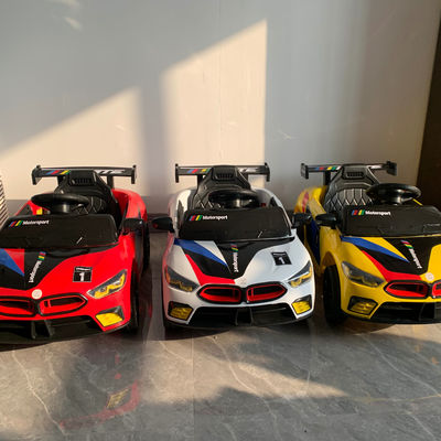 Elektrische auto's voor kinderen met afstandsbediening en licht rijden op kartonnen doos 85*45*25.5