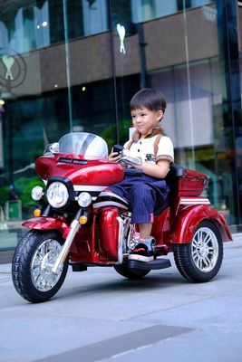 Unisex Geslacht 12V Kinderen rijden op een motor met een sexy model in rode verf uit het aanbod
