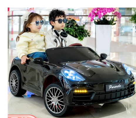 2023 Plastic 12V elektrisch rijden op de auto voor kinderen 2 zitplaatsen laden gewicht 60 kg voordeel
